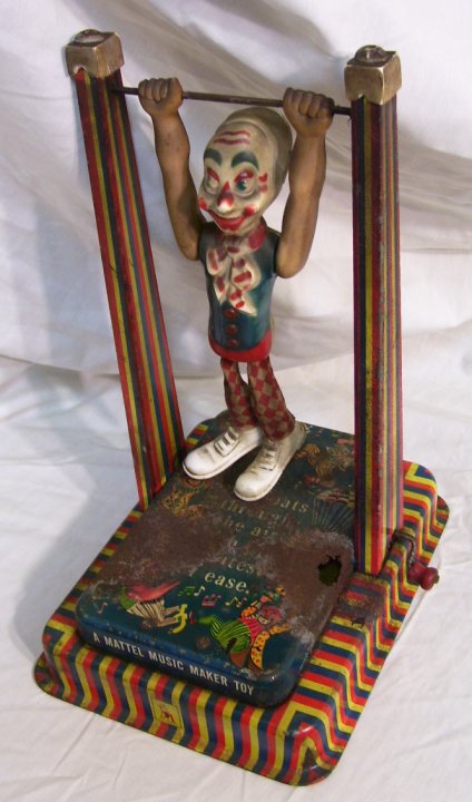 Mattel Music Man Clown on Trapeze Tin Toy, 1953