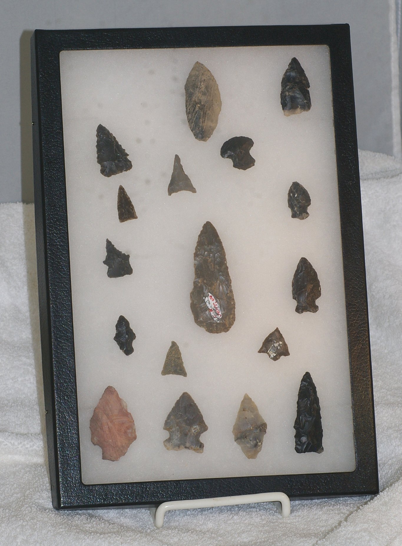 American Indian Artifacts with Arrowheads in Display Case