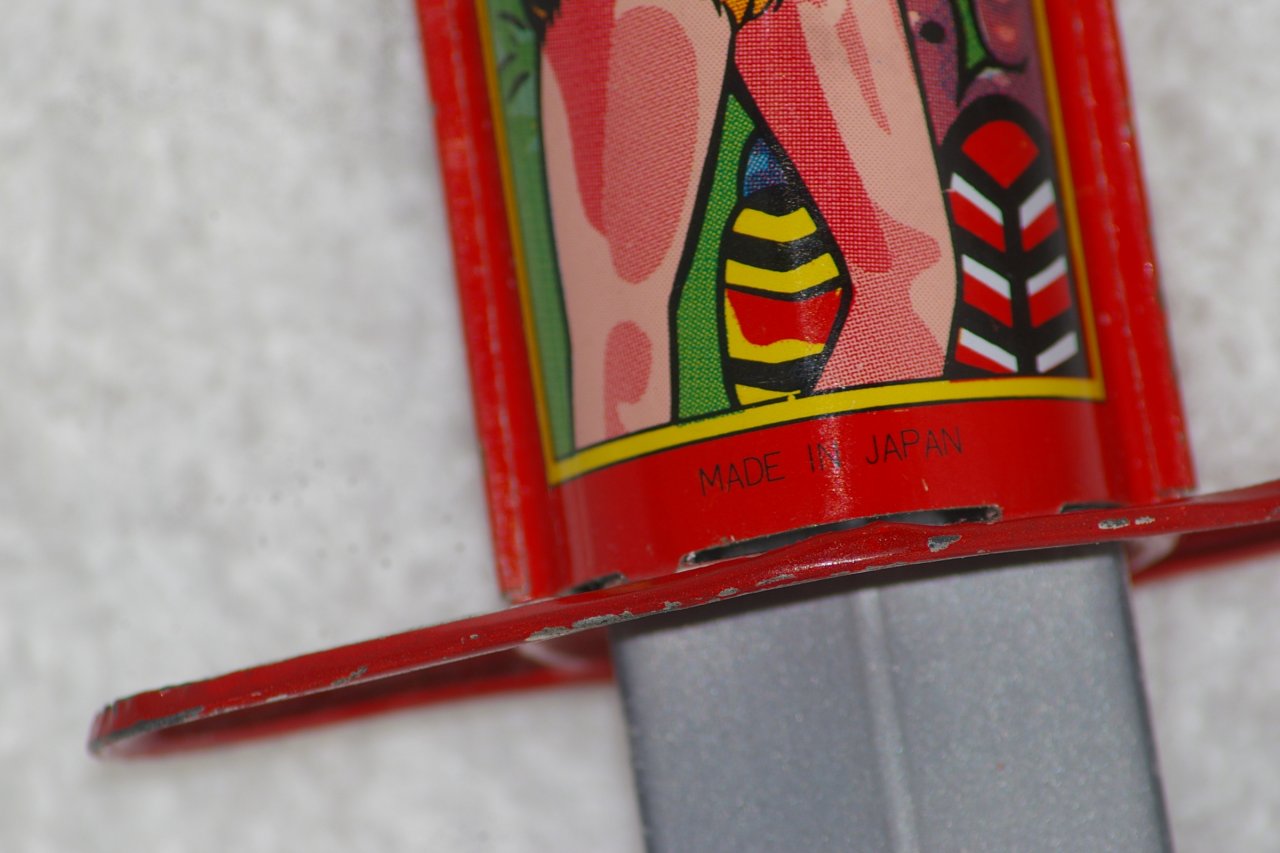 Spring Trick Knife with Tarzan Theme Tin Litho Handle about 1960